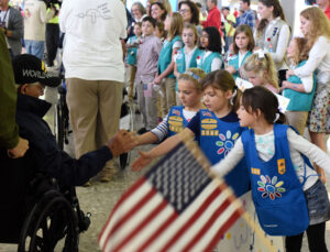 Girl Scouts Greeting Veterans