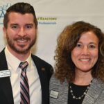 Dulles Area Association of Realtors members Ryan Conrad and Christine Windle posing for a photograph