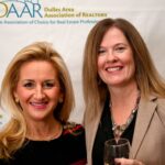 Dulles Area Association of Realtors members toasting a glass of wine
