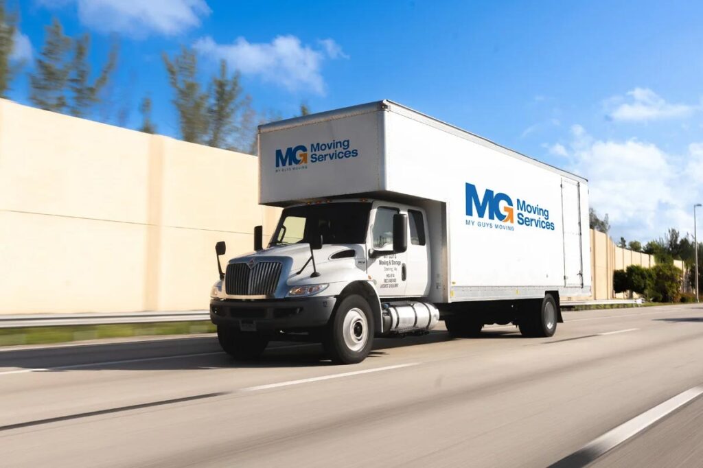 MG Moving Services truck making a delivery