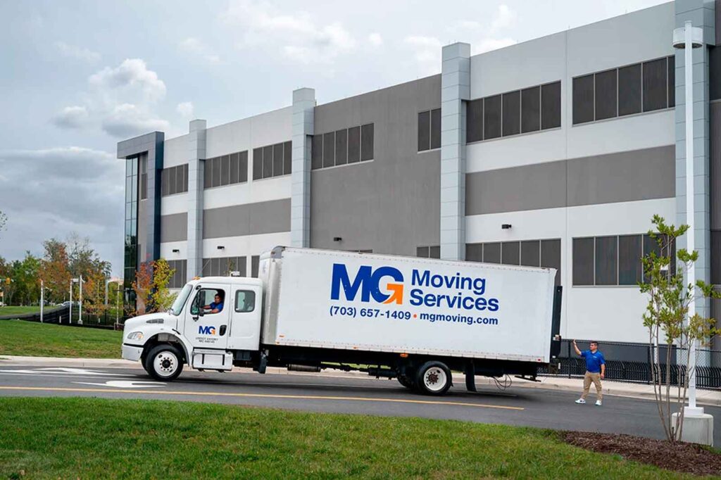 MG Moving Services moving truck outside of their headquarters in Sterling, Virginia