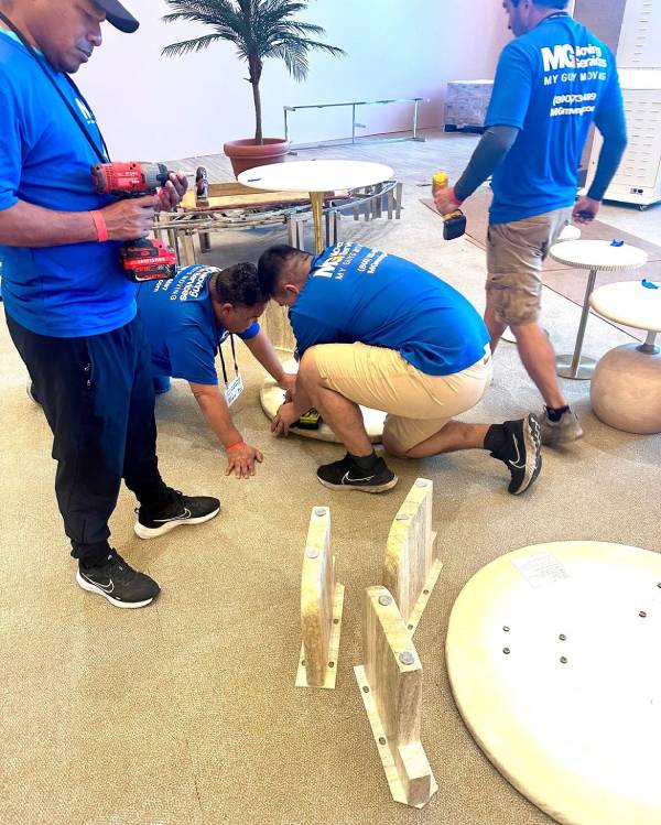 MG Moving Commercial Movers In Florida Assembling Table