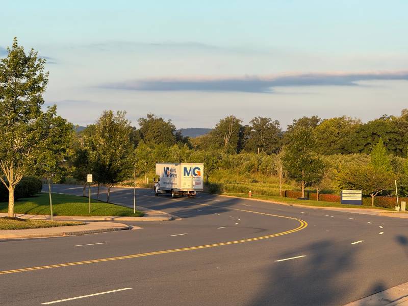 Springfield VA Movers Driving Away To Their Next Move In An MG Moving Truck