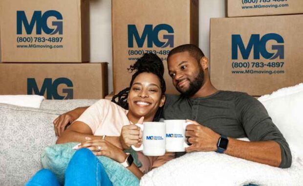 relaxed-couple-on-couch-by-boxes