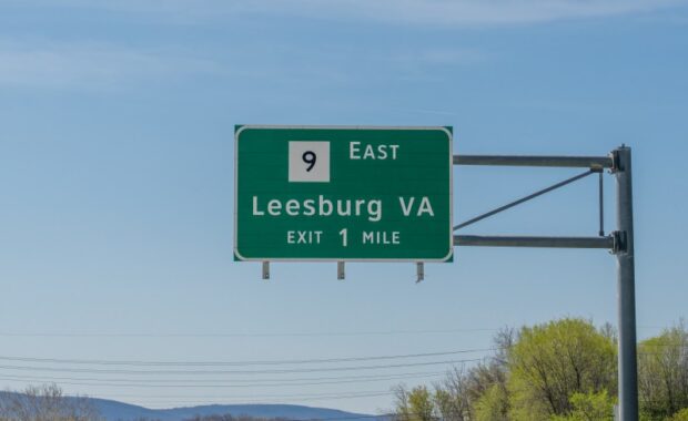 Charles Town, West Virginia - April 20. 2022: Highway exit sign on South 340, East 9 for Leesburg, Virginia