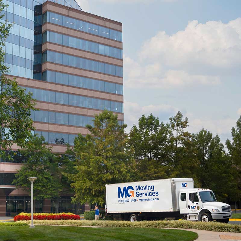 commercial office park with MG Moving truck