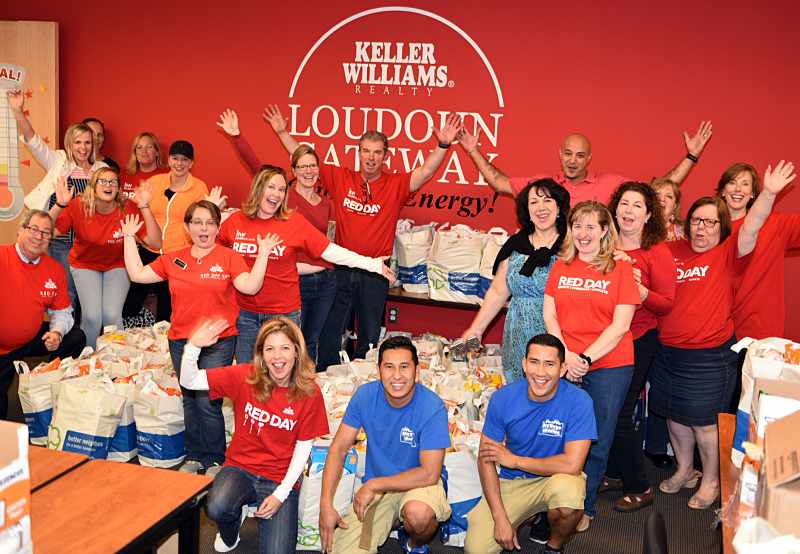 red day group photo at the keller williams fundraising even in loudoun county