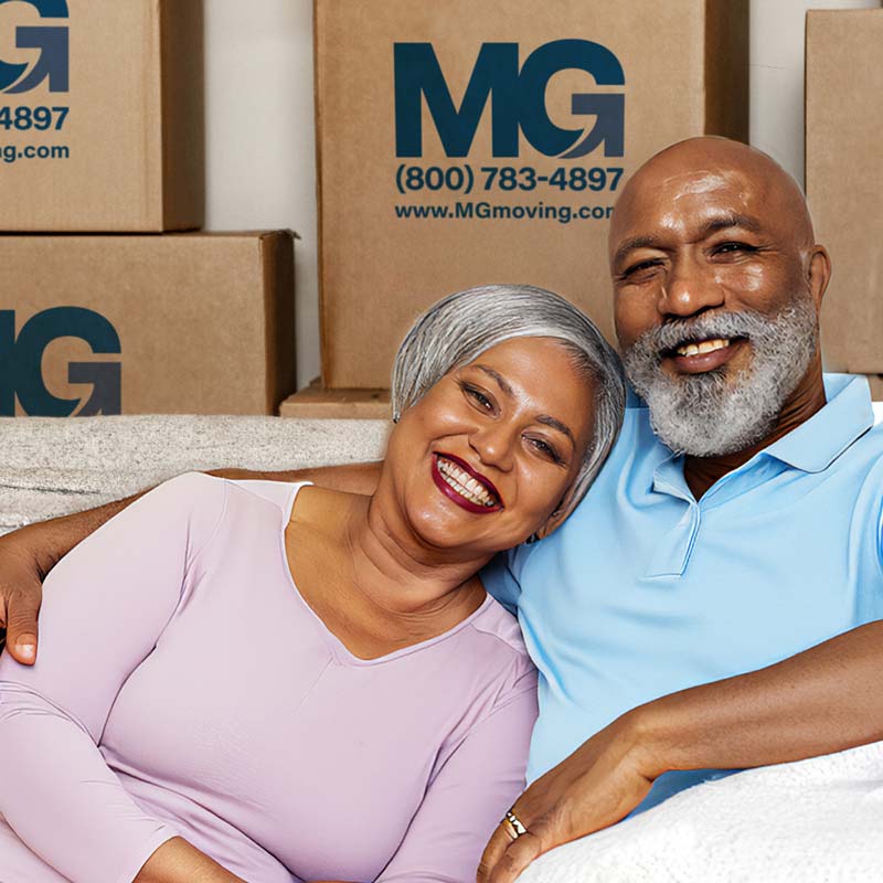 senior couple working with mg moving services