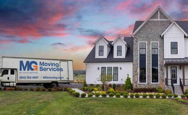 mg moving truck outside of residential home