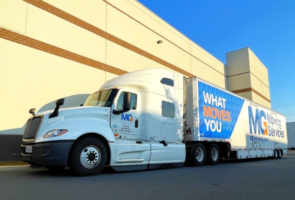 Boynton Beach FL Movers Parking An MG Moving Truck