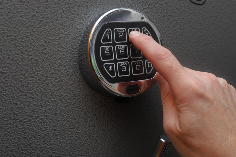 Person entering code to gun safe