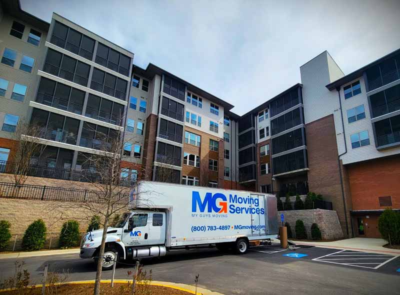 moving truck parked outside a senior living facility