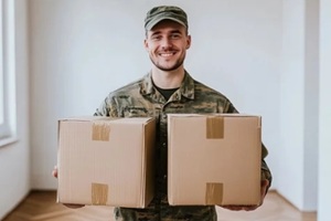 smiling soldier carrying boxes - a dedicated service provider