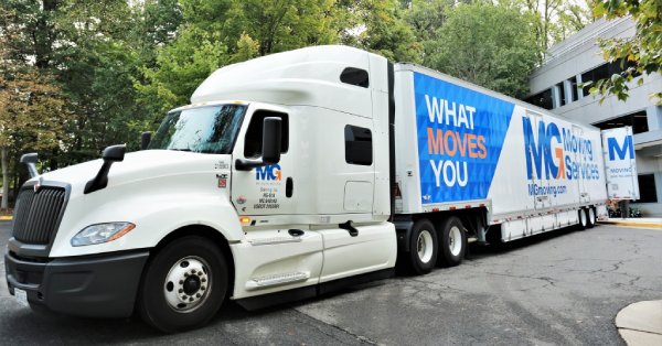 Experienced Coral Gables FL Movers Backing Up MG Moving Truck